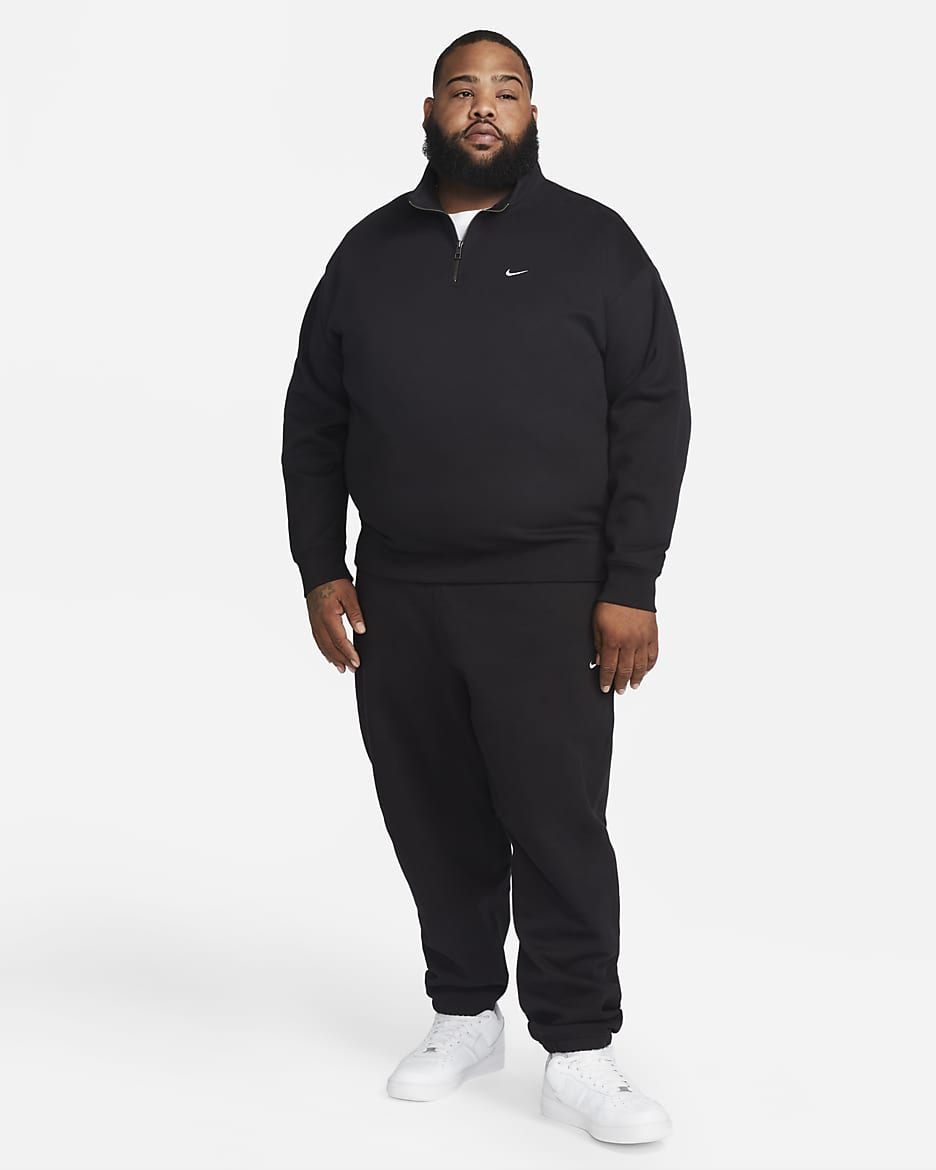 Black nike half zip pullover best sale